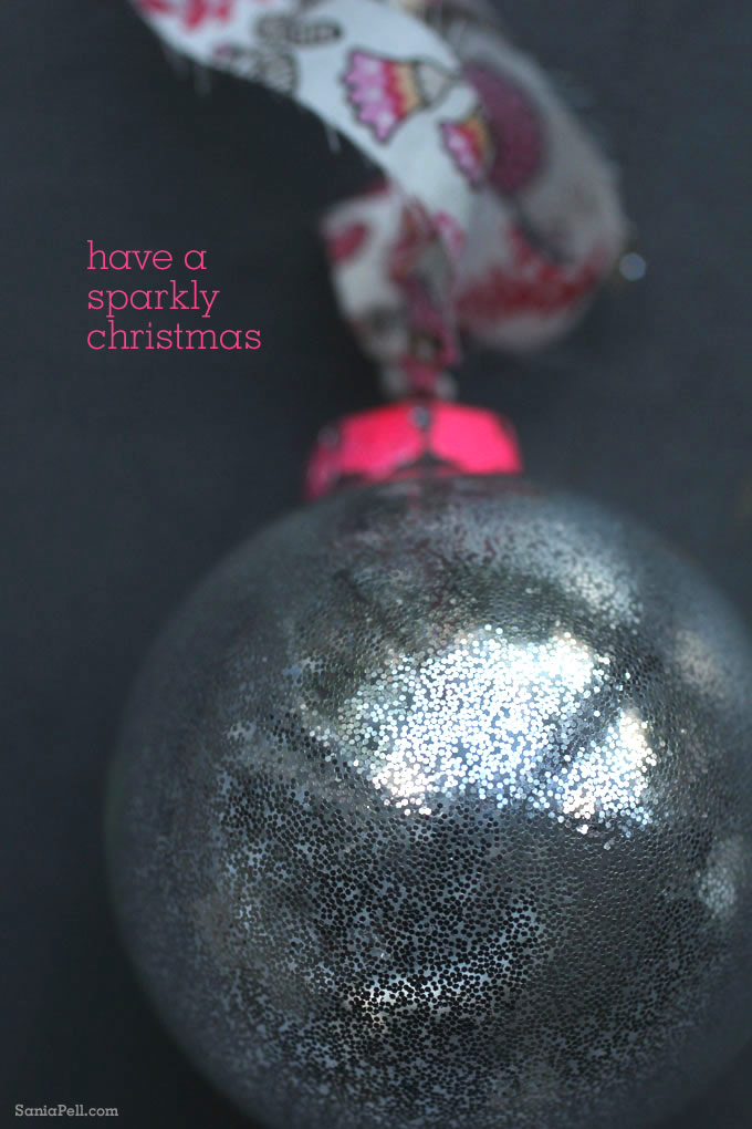 Pink neon and glitter Christmas bauble by Sania Pell